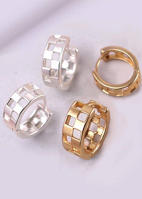Mini checker cutout huggie hoop earrings in matte gold or silver, featuring a modern geometric design and a snug, comfortable fit.
