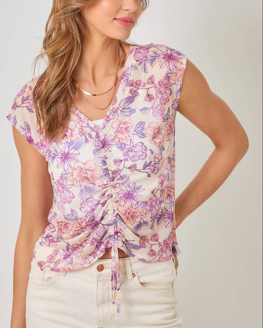 Ivory mesh floral top with ruched front drawstring and cap sleeves.