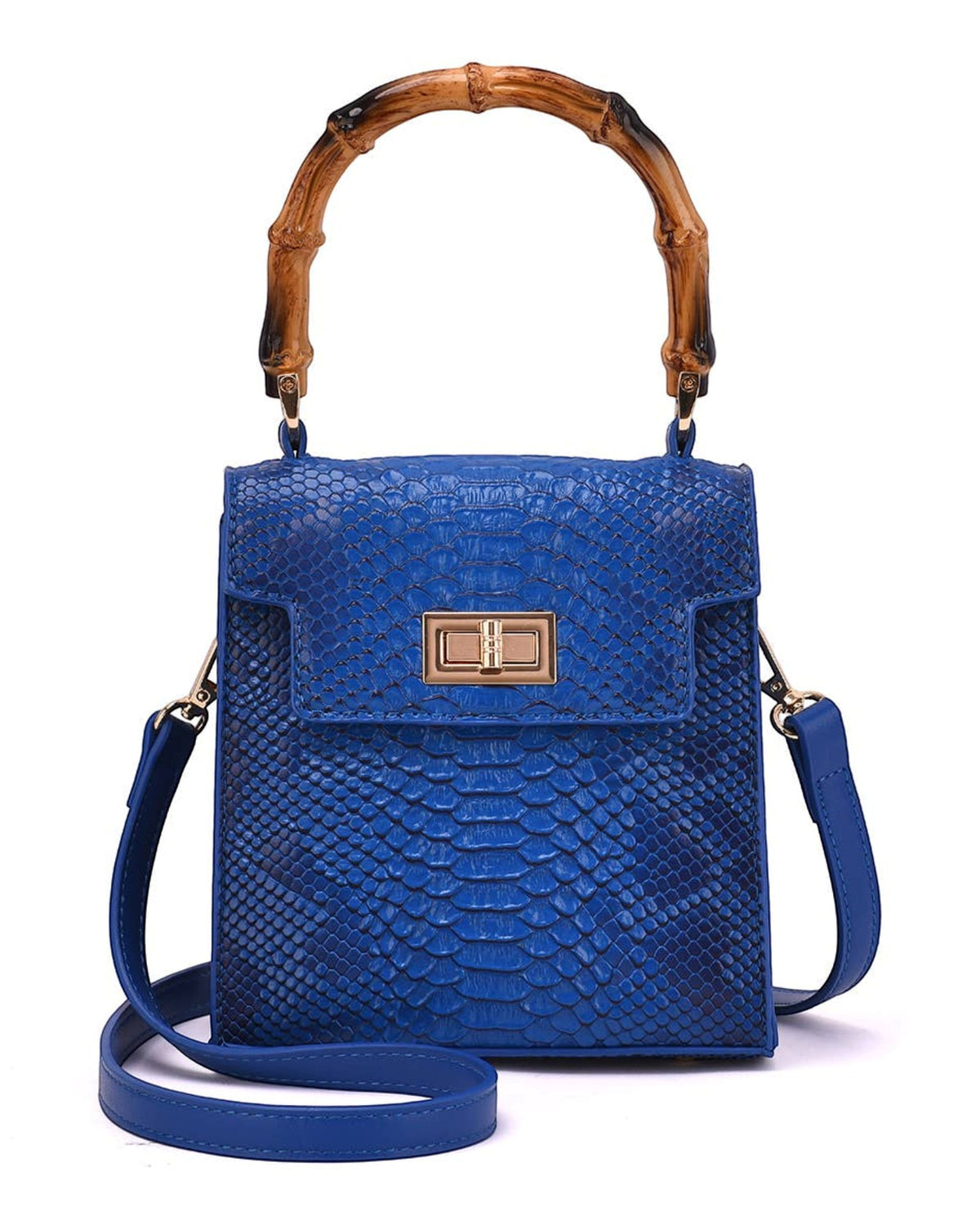 A blue textured faux-snakeskin handbag with a natural bamboo top handle and a gold-tone turn-lock closure on a white background.
