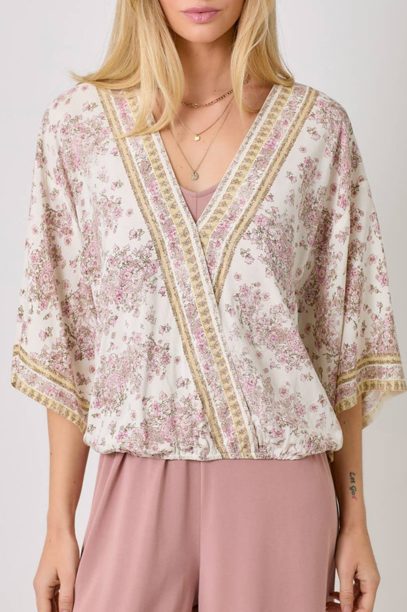 Ivory floral kimono wrap top with 3/4 sleeves and vintage floral print.