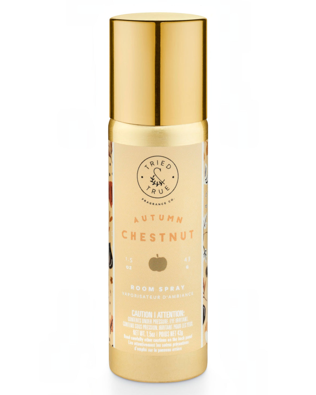A bottle of Tried True Apothecary 'Autumn Chestnut' room spray with a metallic gold cap and a beige label featuring a chestnut illustration, set against a plain white background.