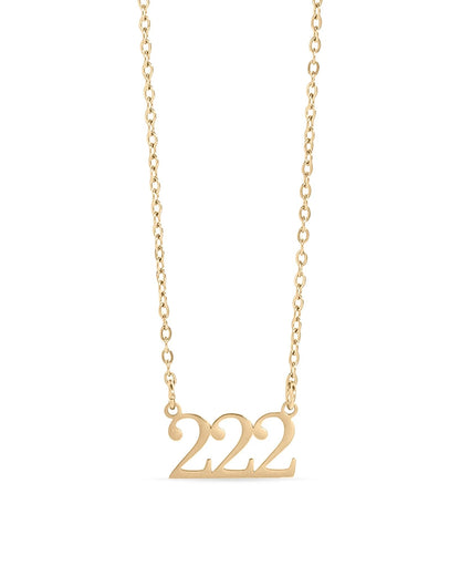 Gold waterproof necklace with '222' pendant on a white background.