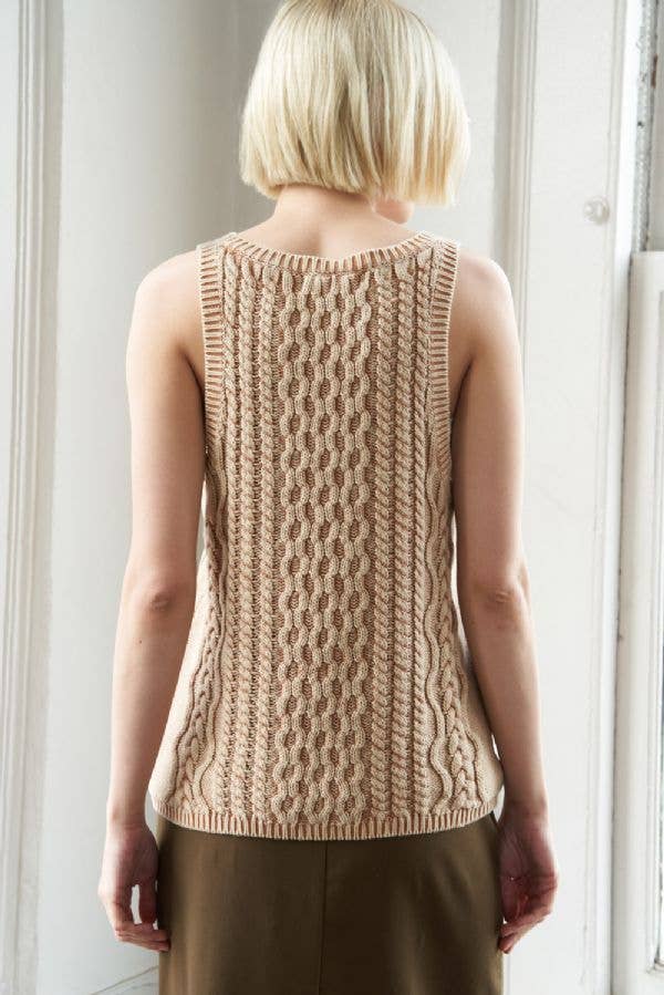 Washed camel colored cable knit tank top with U neckline and sleeveless cut.