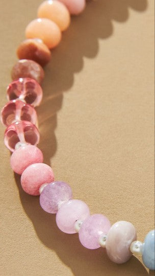 Natural agate glass semi-precious bead necklace with gold-plated finish, adjustable length, and lobster claw clasp.