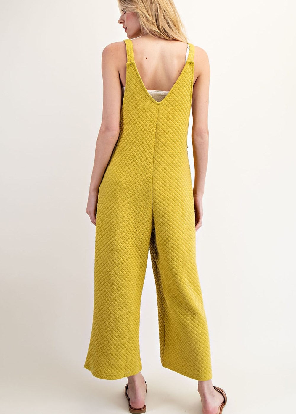 Go Anywhere Textured Jumpsuit in Avocado - back view. 