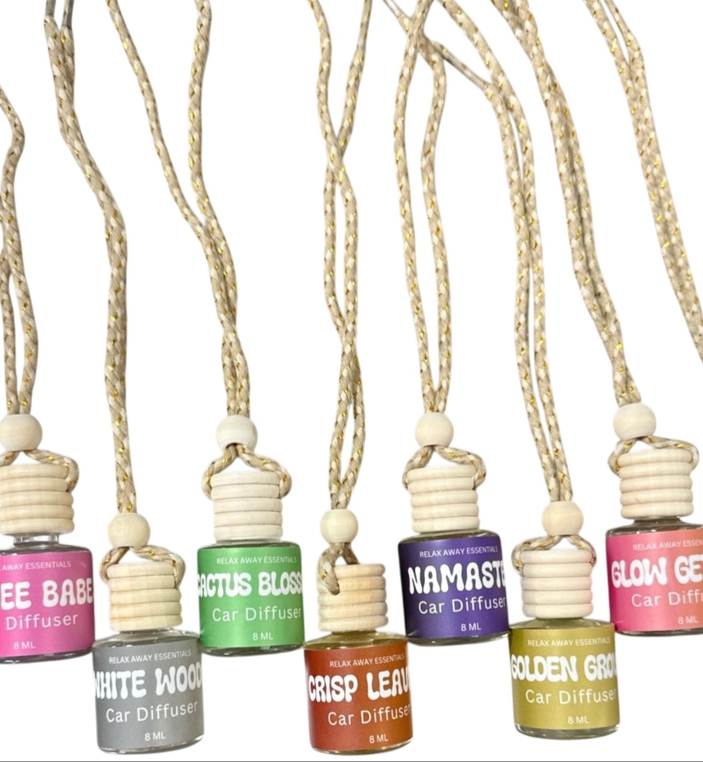 Set of car diffusers with various scents on a white background.