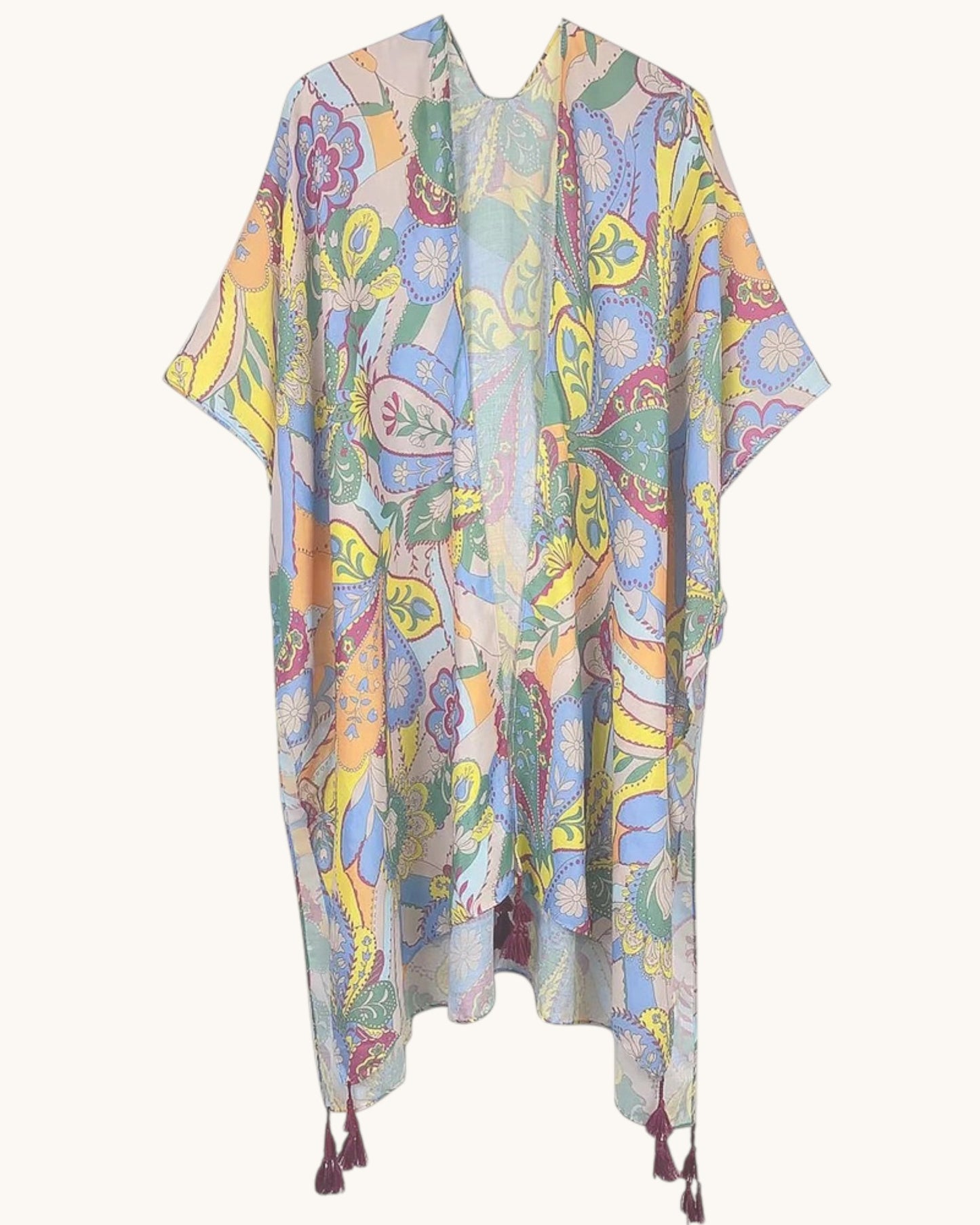 Colorful patterned kimono-style garment in blues, greens and yello on a white background.
