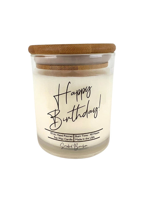 Candle with 'Happy Birthday' text on a white background.