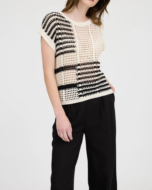 Black and cream sheer crochet short sleeve top with relaxed fit. 