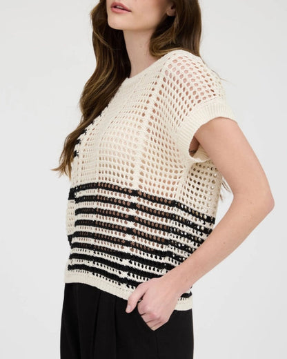 Black and cream sheer crochet short sleeve top with relaxed fit.