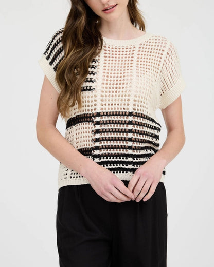 Black and cream sheer crochet short sleeve top with relaxed fit.