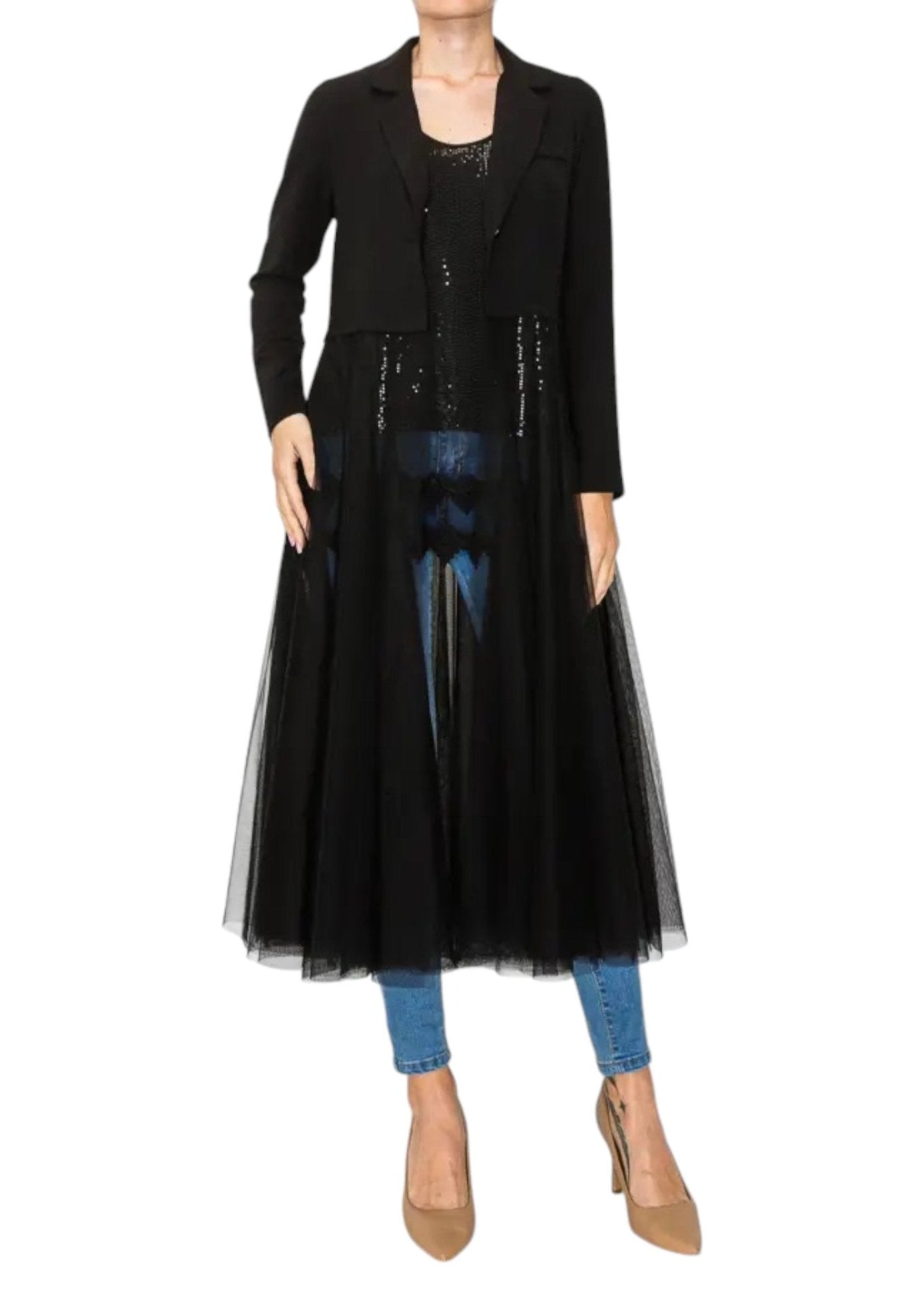 Woman wearing a crop black blazer with long, flowing tulle / mesh duster.