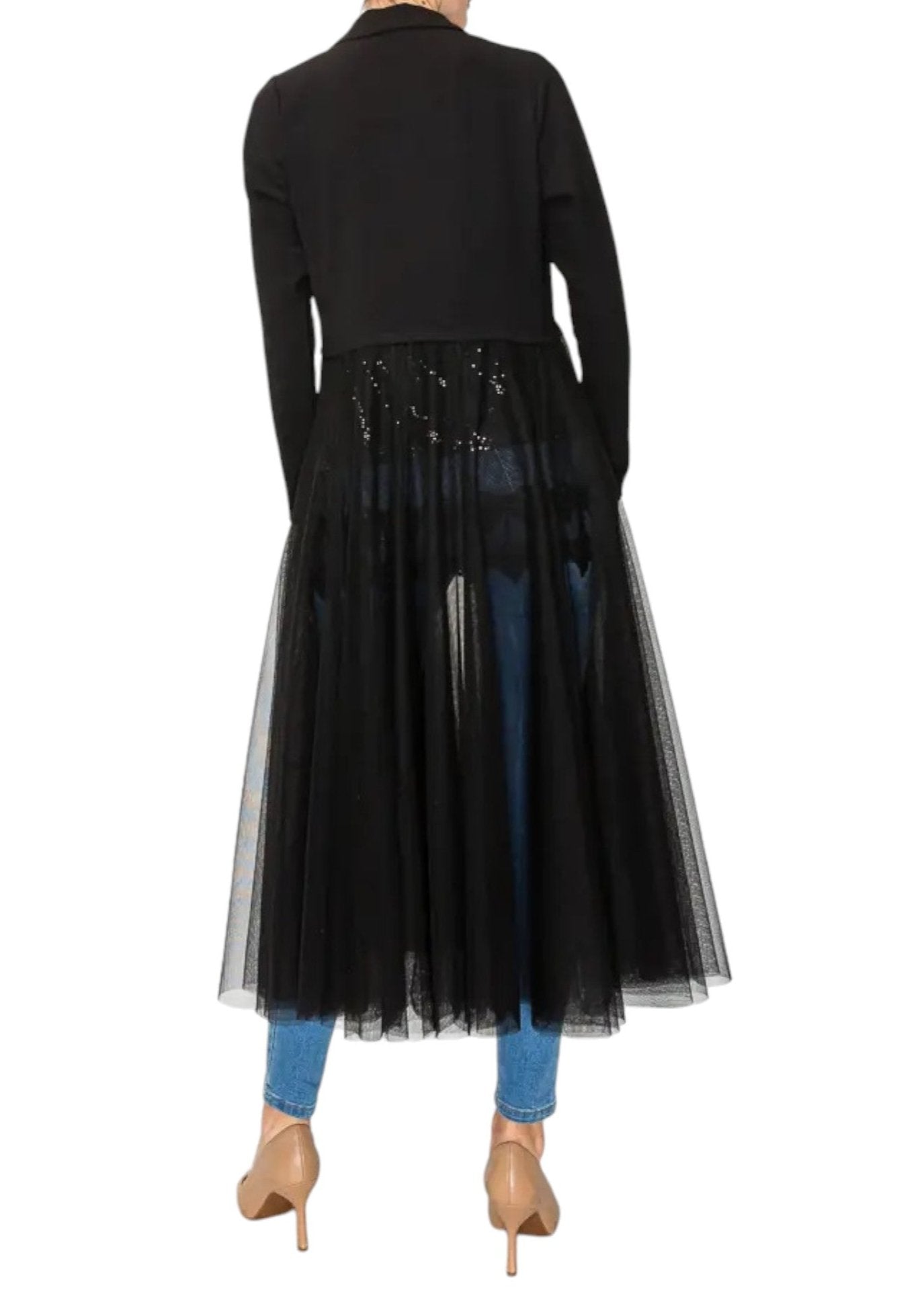 Woman wearing a crop black blazer with long, flowing tulle / mesh duster.