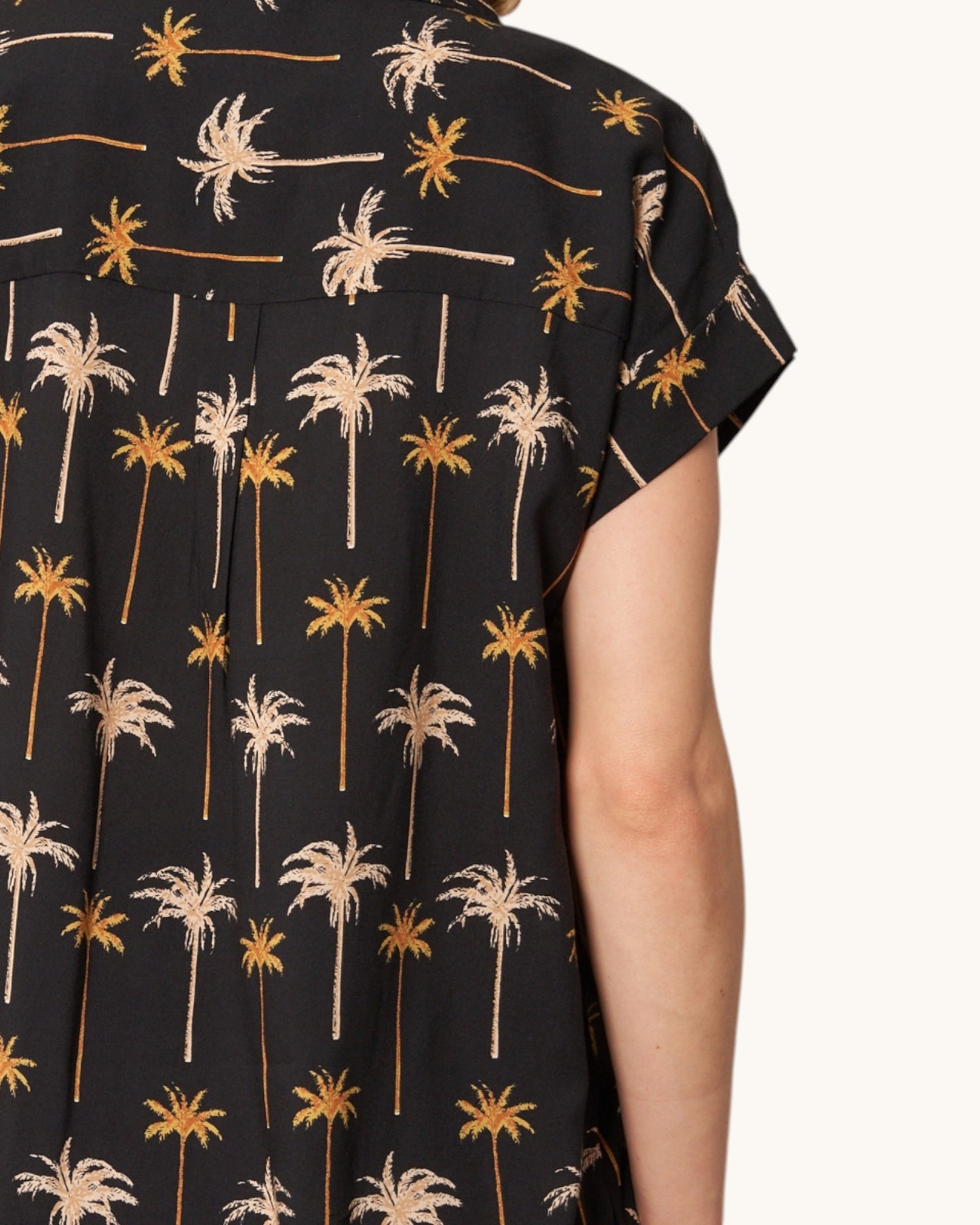 Close up back view of the Moonlit Tropics Button Down Shirt.