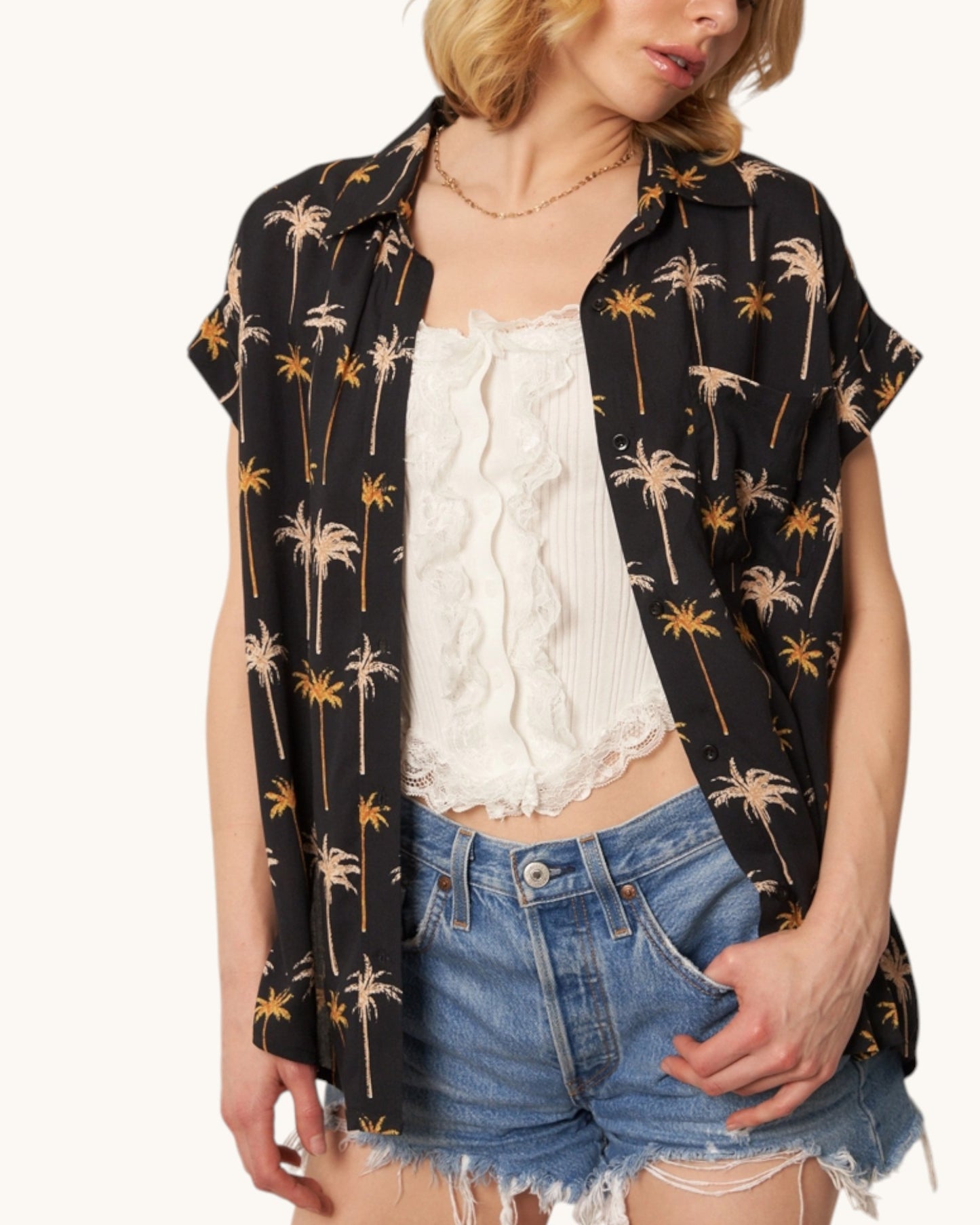 Moonlit Tropics Button Down Shirt paired with white tank top and denim shorts. 