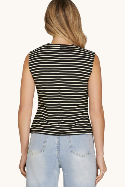 Back view of a black sleeveless vest with Ivory stripes.