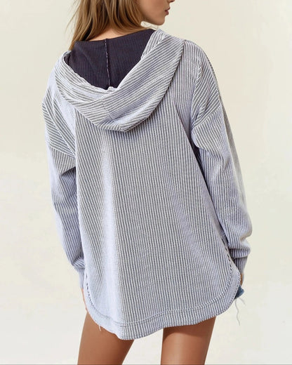 Off white and black striped ribbed hoodie with V neckline. 