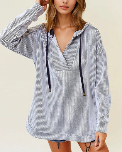 Off white and black striped ribbed hoodie with V neckline.