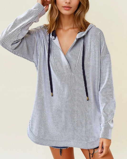 Off white and black striped ribbed hoodie with V neckline.