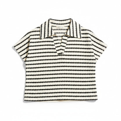 Black and white striped polo shirt on a white background.