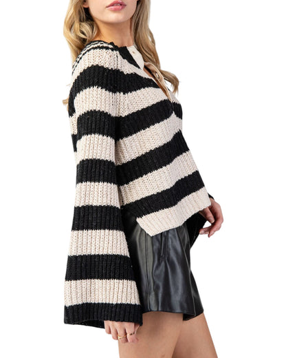 Black & Tan Striped Bell Sleeve Sweater with bold stripes, notched neckline, and a slightly cropped fit featuring side slits and flowy bell sleeves.