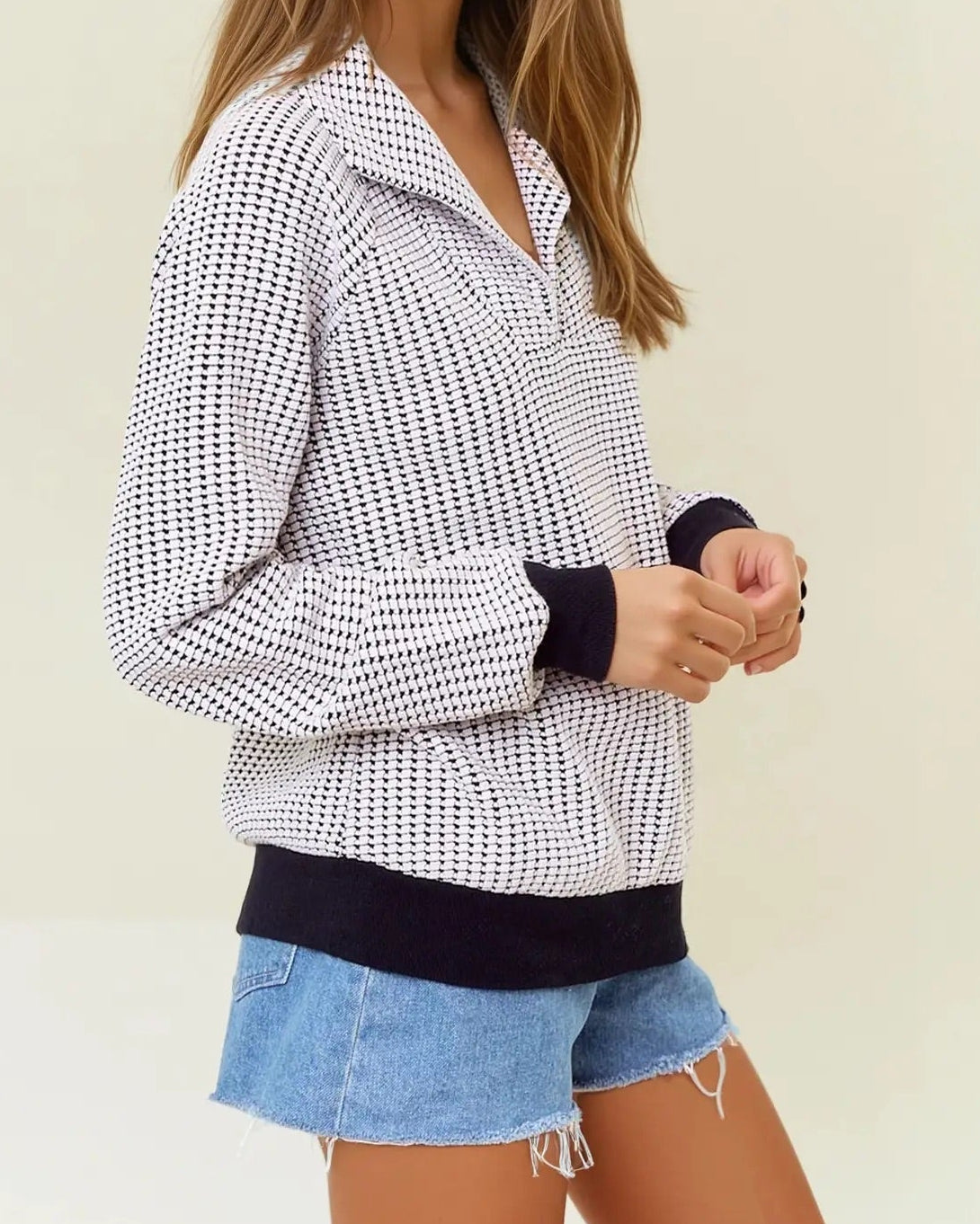 Two-tone black and white cotton waffle collared sweatshirt. 