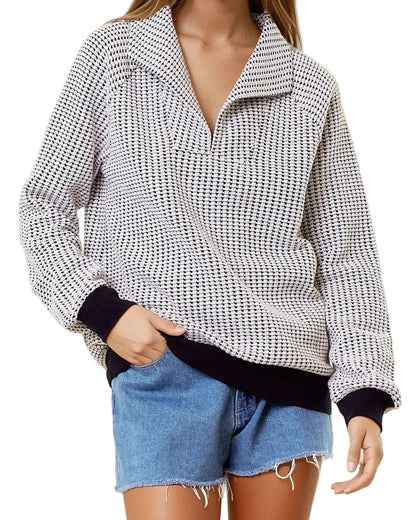 Two-tone black and white cotton waffle collared sweatshirt. 