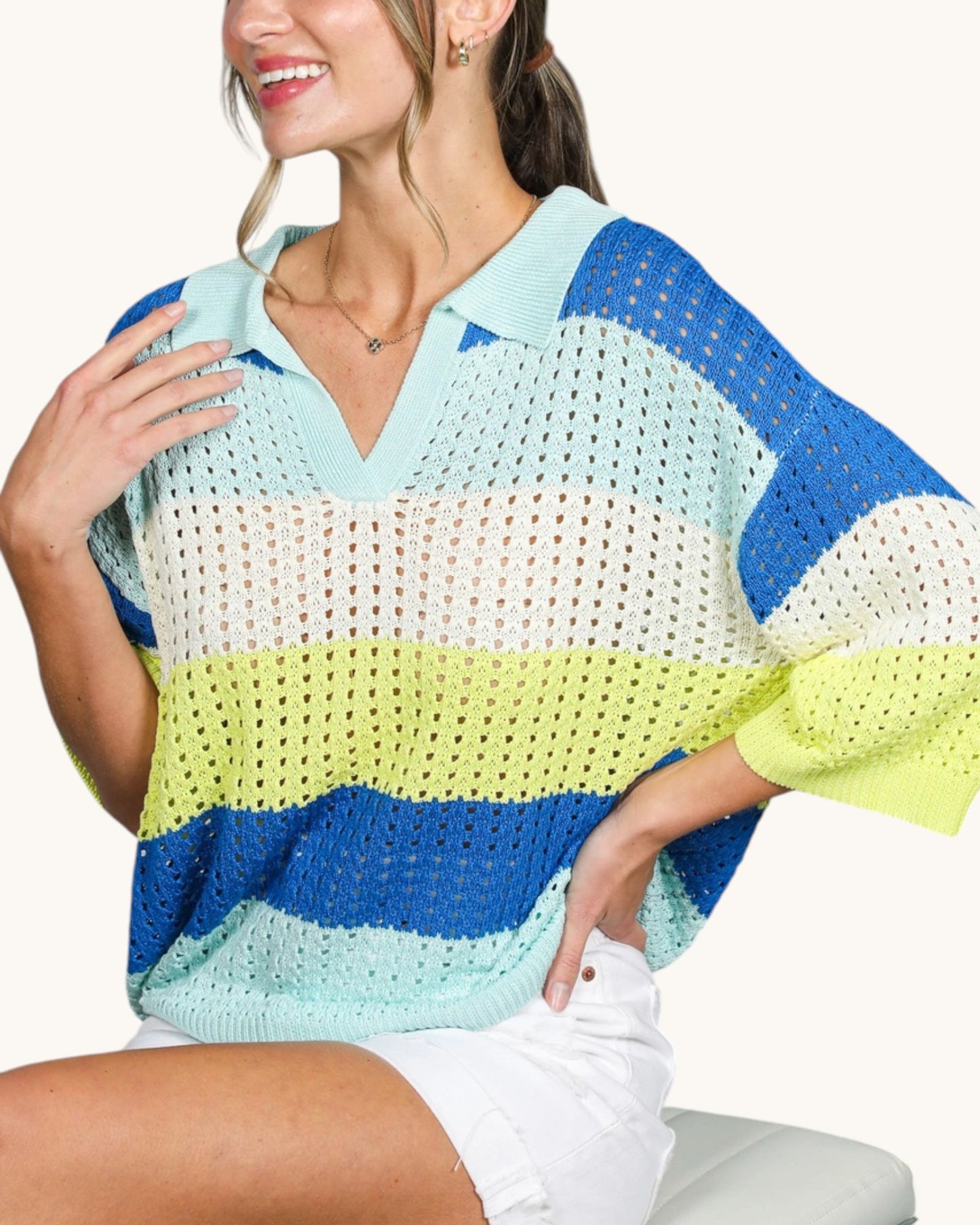 Blue and green colorblock open knit top with collared split neckline and V-shape placket.