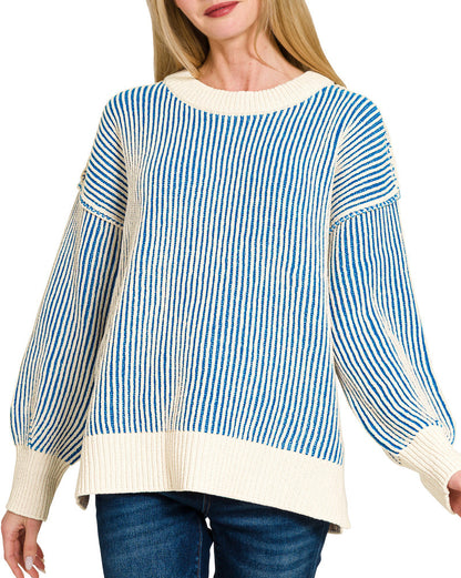Woman wearing Blue and Ivory Two Tone Striped Crew Neck Sweater.