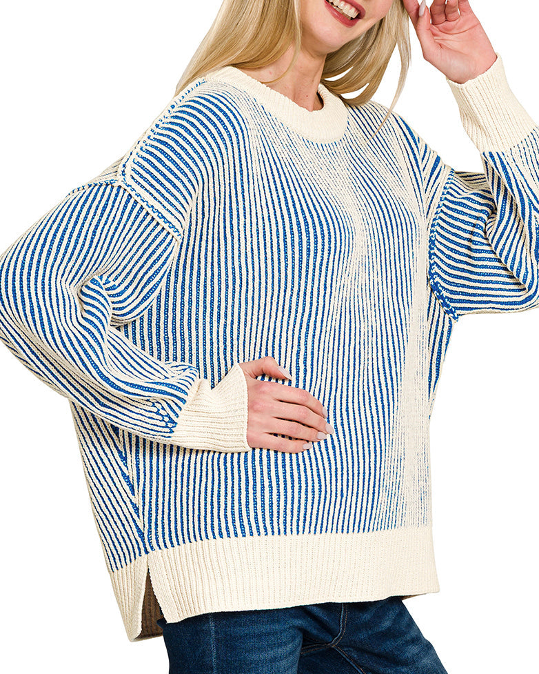 Woman wearing Blue and Ivory Two Tone Striped Crew Neck Sweater.
