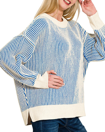 Woman wearing Blue and Ivory Two Tone Striped Crew Neck Sweater.