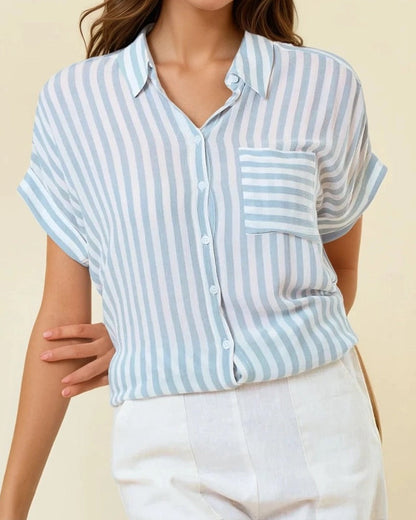 Lightweight Blue and white striped short sleeve button-up with front pocket and collar.