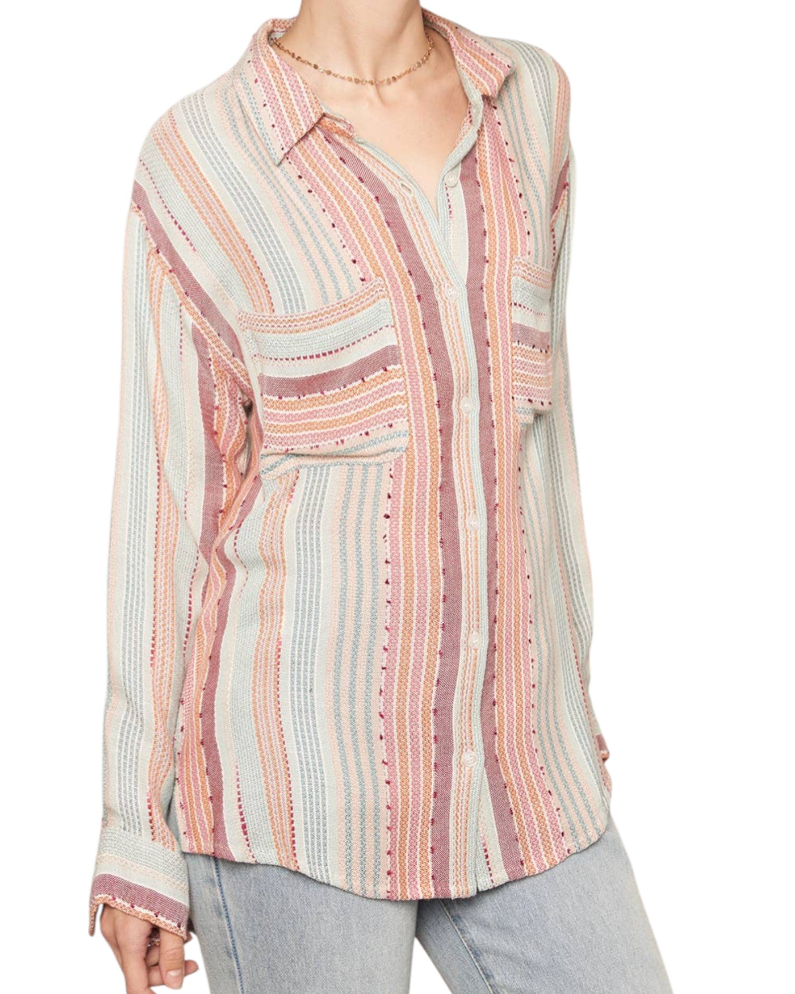 Multicolored striped shirt worn by a person on a white background
