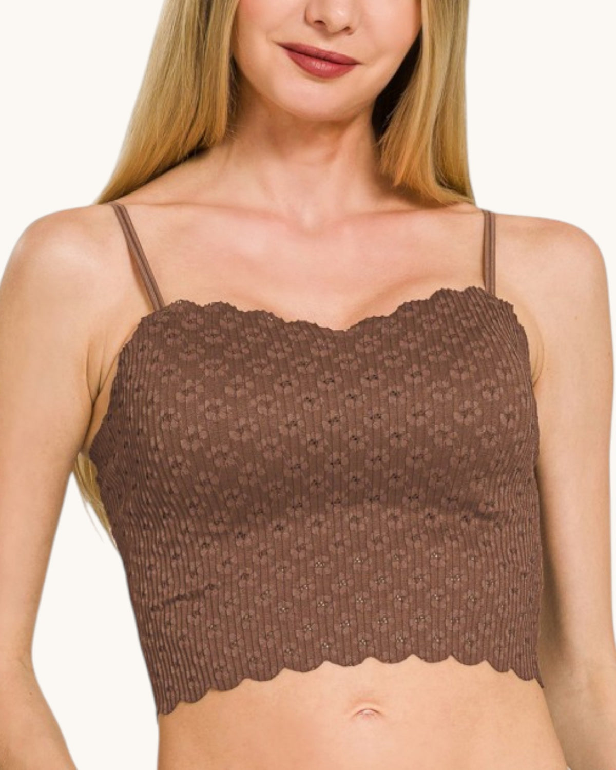 Model wearing a chocolate brown pointelle bralette.