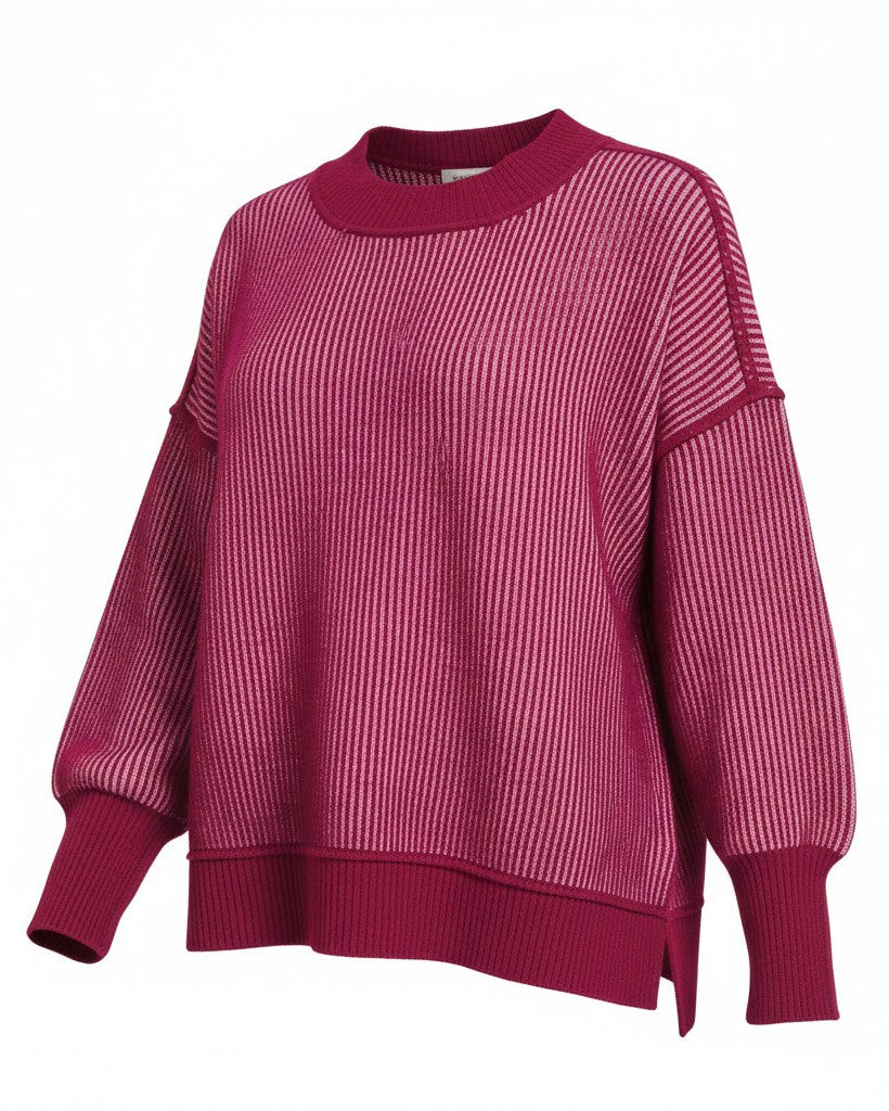 Pink and cabernet striped sweater on a white background.