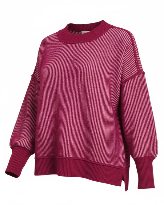Pink and cabernet striped sweater on a white background.