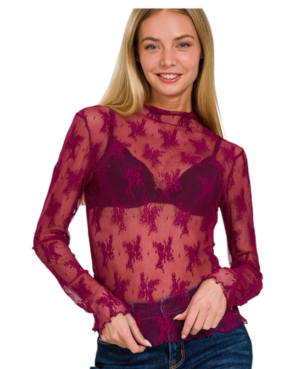 Woman wearing a Floral Embroidered Sheer Cranberry Long Sleeve Top.