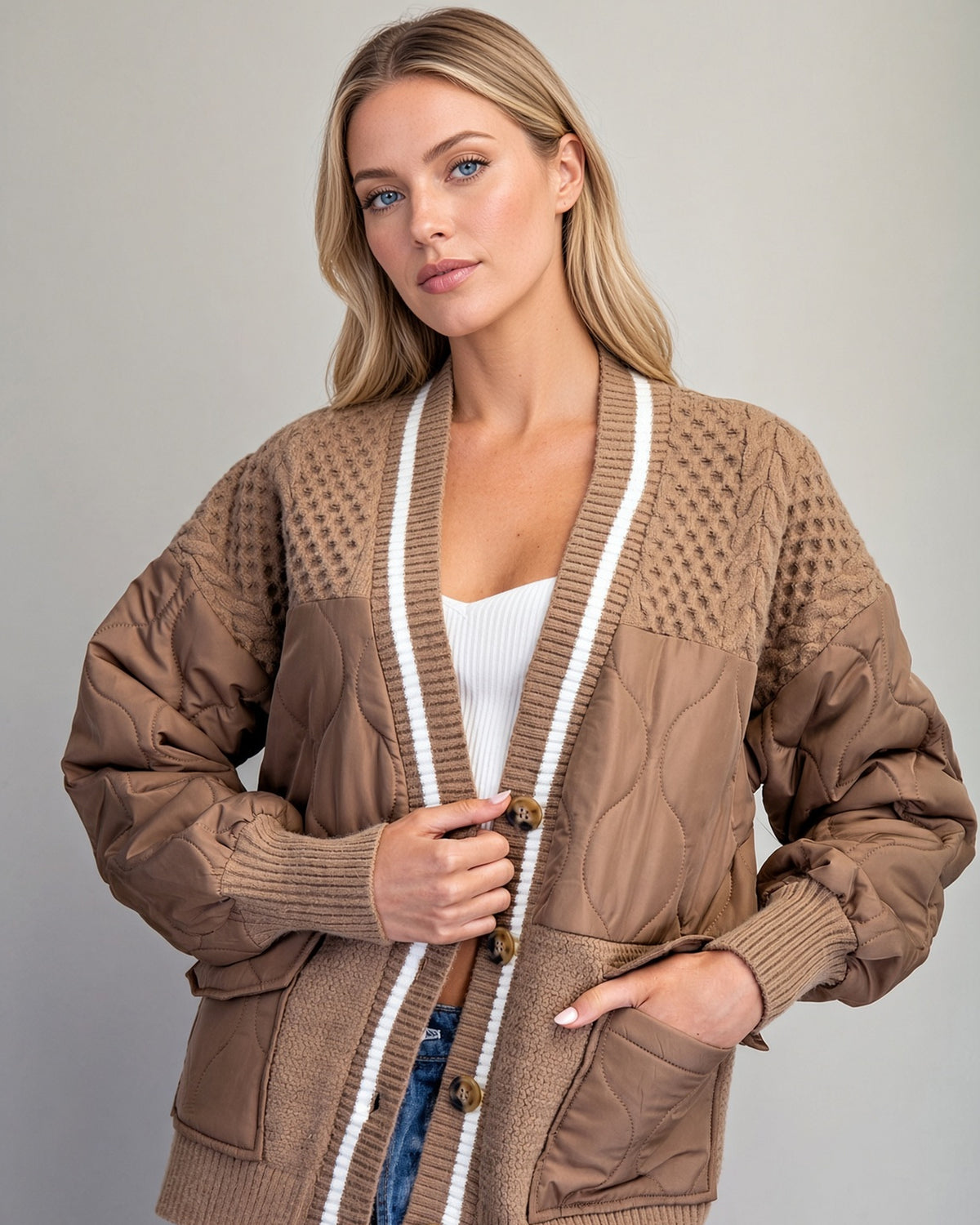 Caramel Delight sweater jacket with quilted panels, knit shoulders, striped front trim, and oversized pockets.