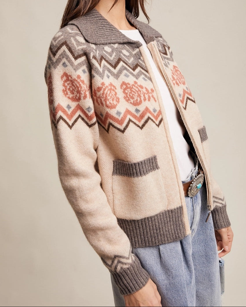 Retro Rose Fair Isle Zip Cardigan in grey, oatmeal, and salmon with floral jacquard  and zigzag pattern with ribbed collar and front pockets.
