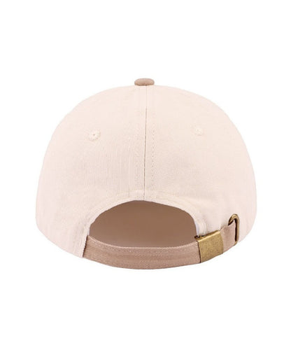 Beige cap with brown brim on a white background.