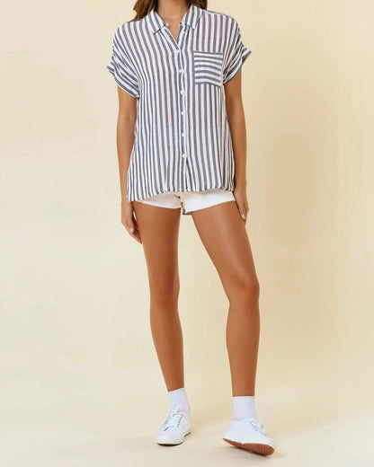 This image features a stylish coastal-inspired button-up shirt, showcasing a chic striped pattern in charcoal and white. The shirt is designed with a classic collar and short sleeves, giving it a casual yet polished appearance.