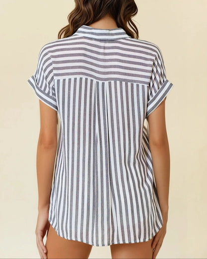 Charcoal and white striped short sleeve button-up with front pocket and collar.