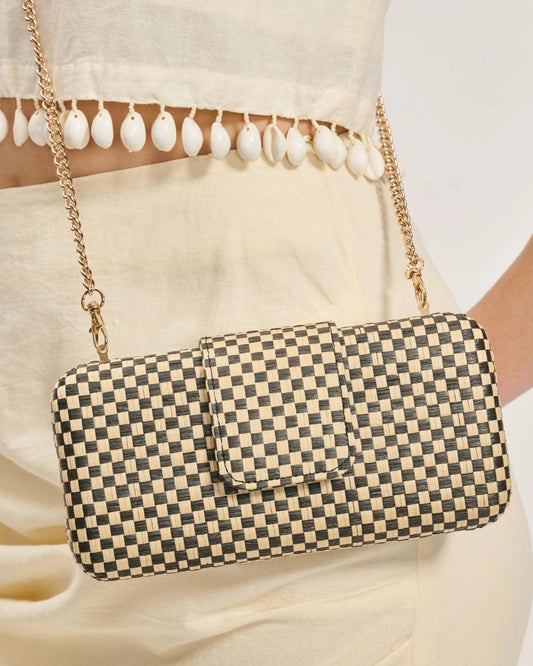 Black and Natural Checkered crossbody bag with chain strap.