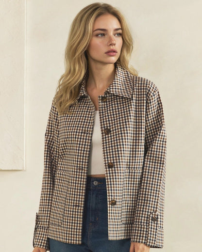 Front view of brown and cream check jacket with long sleeves, button-tab cuffs, and patch pockets.
