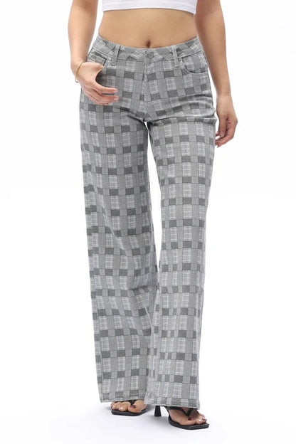 Charcoal and Gray plaid denim jeans shown from the waist down.