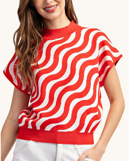 Cherry red and white swirl short sleeve summer sweater, front view.