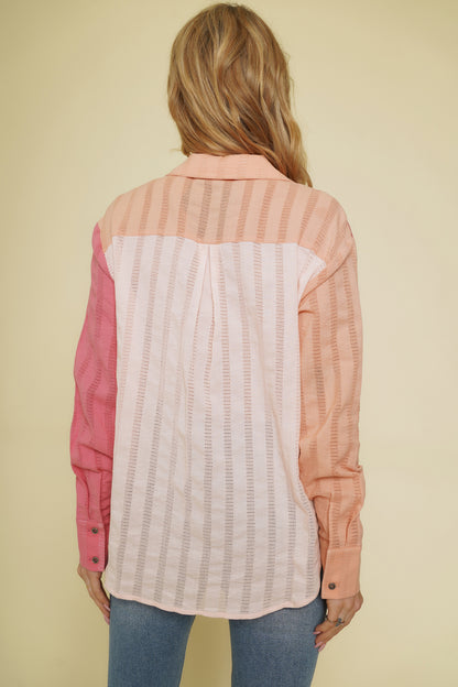 Peach and pink colorblock button-down shirt with embroidered stripes.