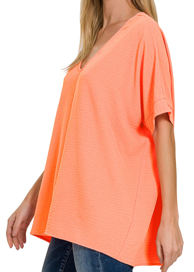 Coral lightweight woven V-neck short sleeve top for women