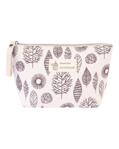 Natural Style Cosmetic Bag in Ivory/Brown and Charcoal/Ivory with tree and leaf prints, lined and zippered for travel or makeup storage.