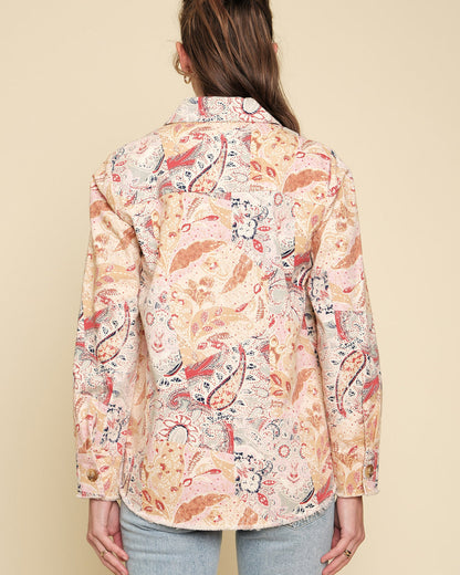Paisley patchwork shacket with frayed hem and button-up front.